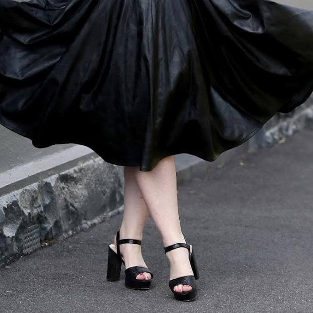 Oh Celeste - stylish black heeled shoes paired with a flowing leather skirt, perfect for alternative fashion.
