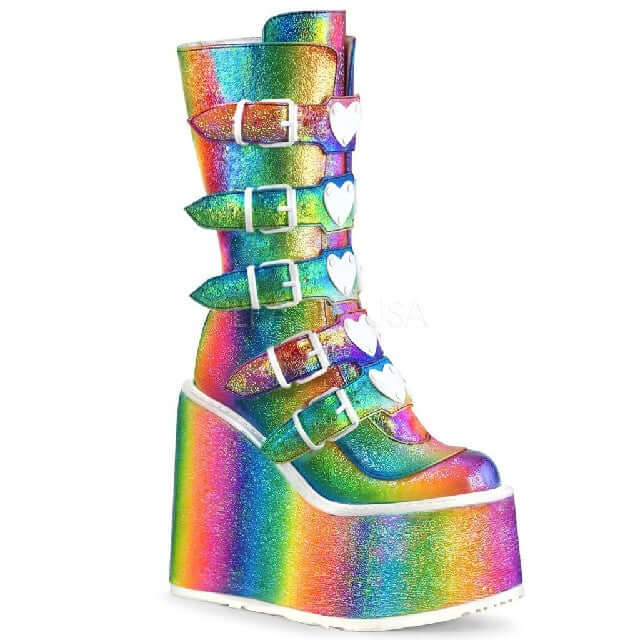 Dazzling rainbow Demonia platform boots showcasing vibrant colors and funky heart buckles. The Magic of Demonias.