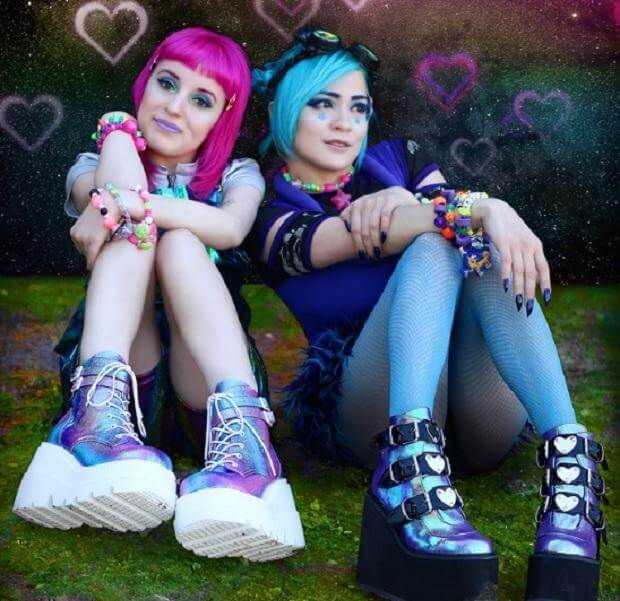 Festival Footwear - We have you covered! Stylish festival-goers in colorful shoes showcasing rave culture.